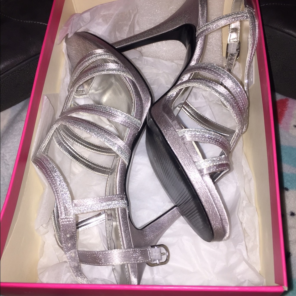 Silver sparkly heels.