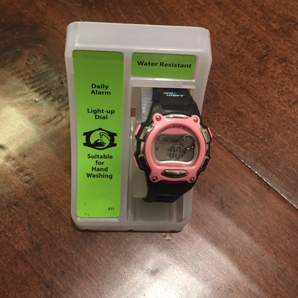 Pink and black water resistant watch
