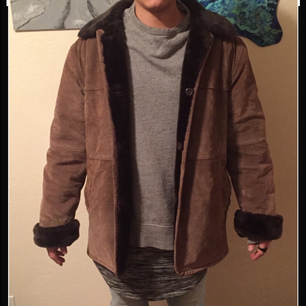 Suede coat lined with black plush faux shearling