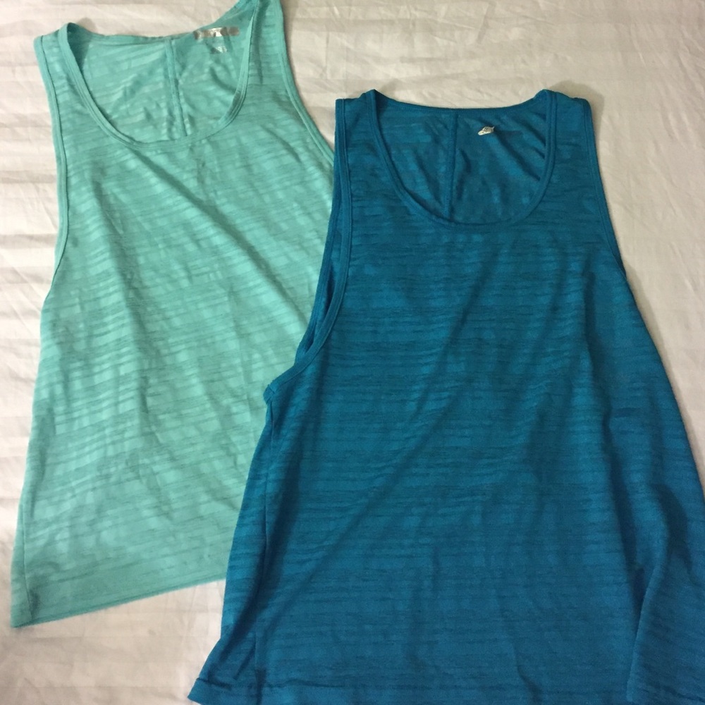 Two workout muscle tanks