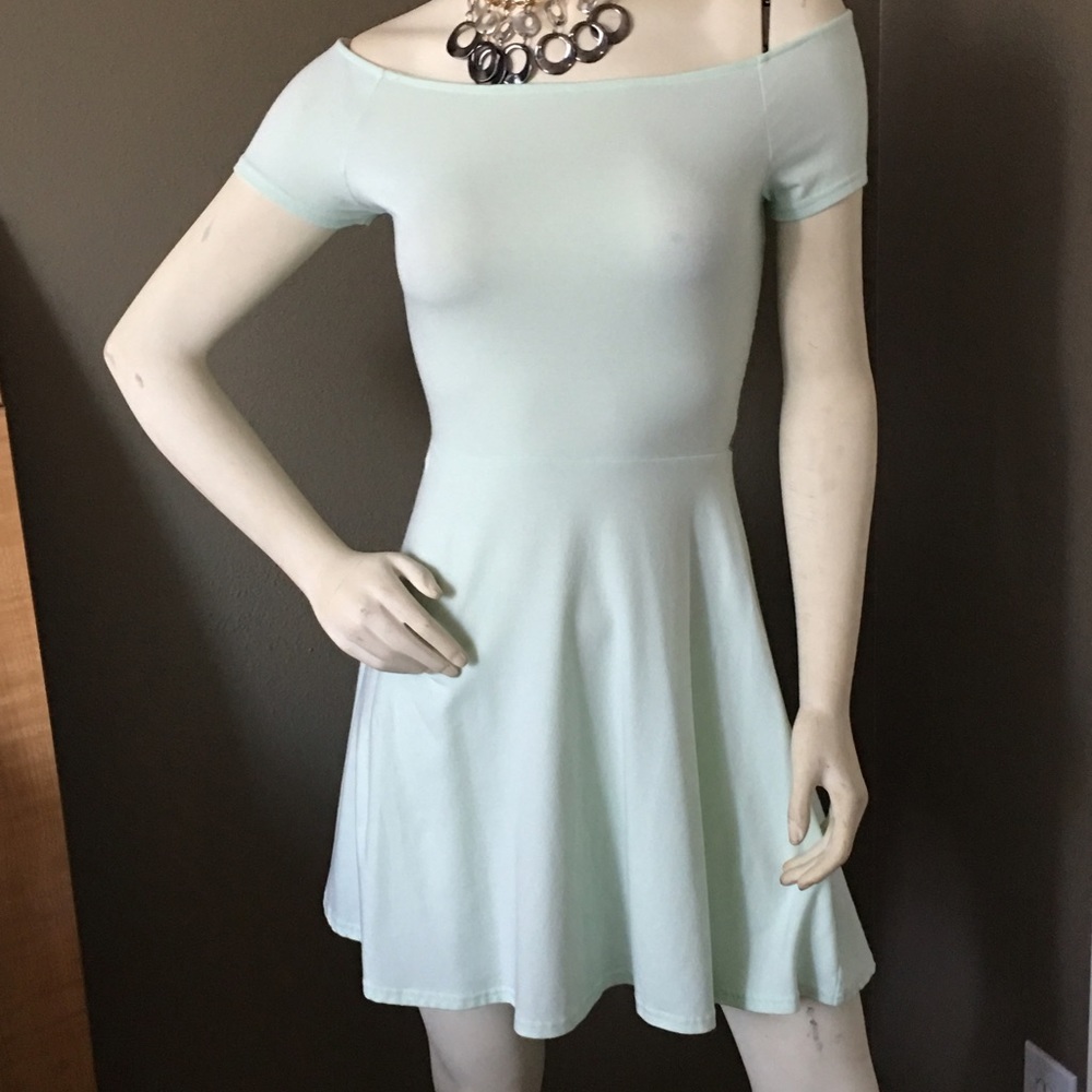 Off the shoulder sundress. Form fitting!