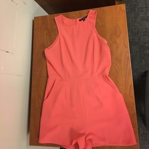 Coral romper, with pockets and zipper