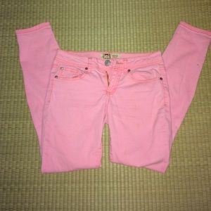 Bright pink skinny jeans