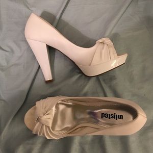 White pumps. Worn twice