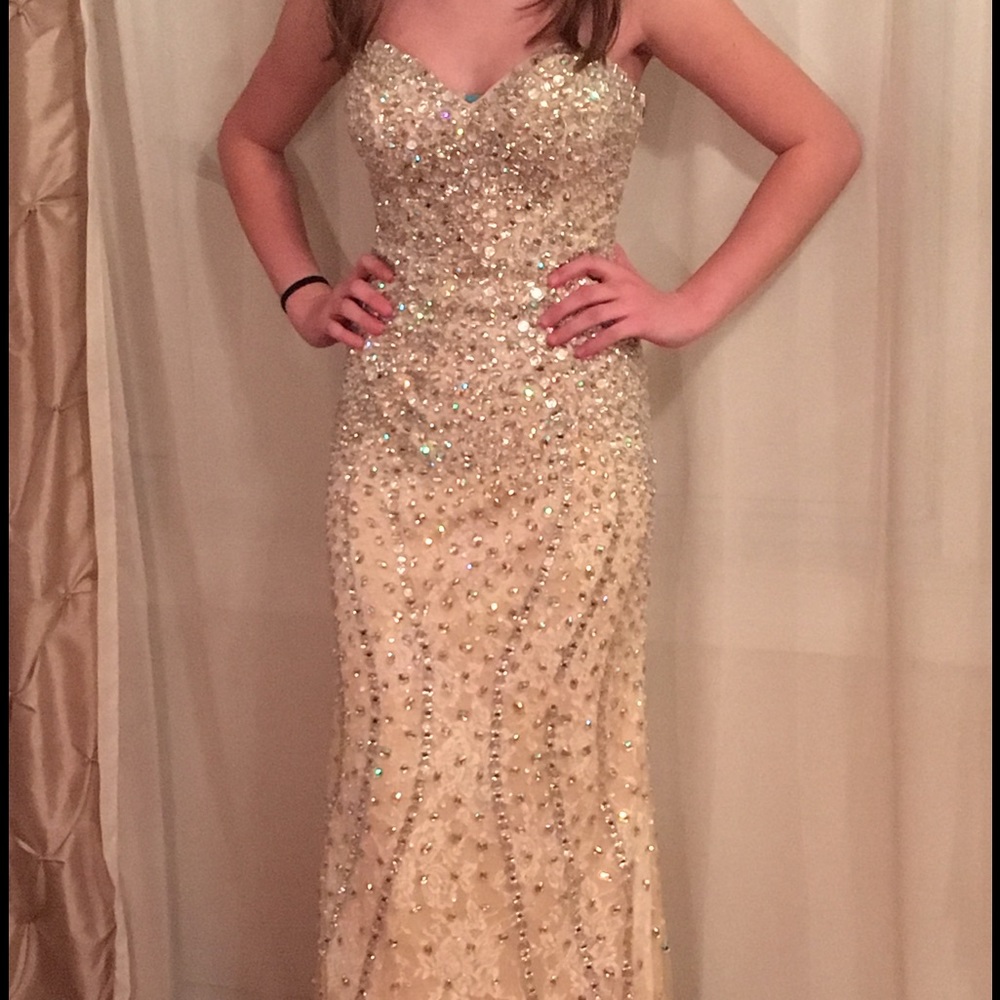 Fully beaded evening gown from Camille store