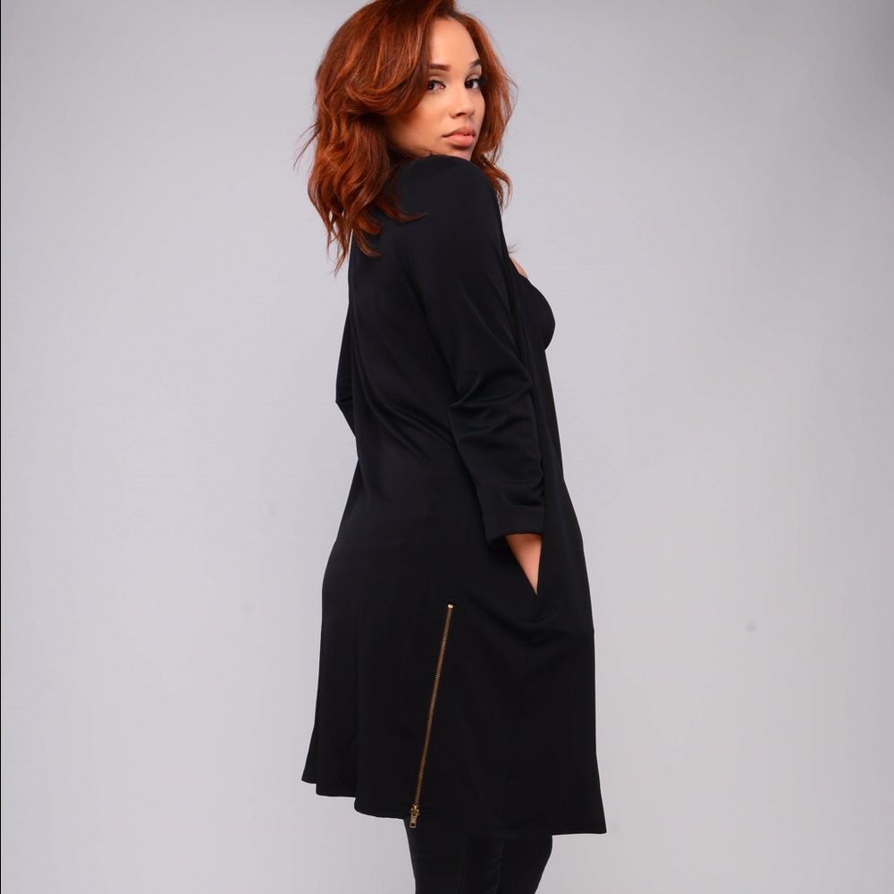 Black duster coat. Brand new. SML AVAILABLE