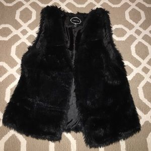 Black faux fur vest