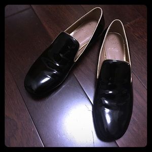 Patent black leather loafers with gold trim