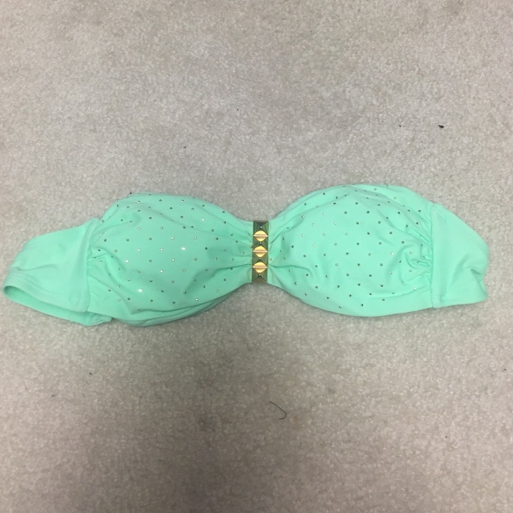 Mint green bikini top w gold studs and a gold bar