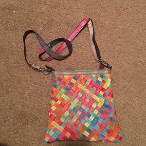 Multi-colored leather bag with adjustable straps