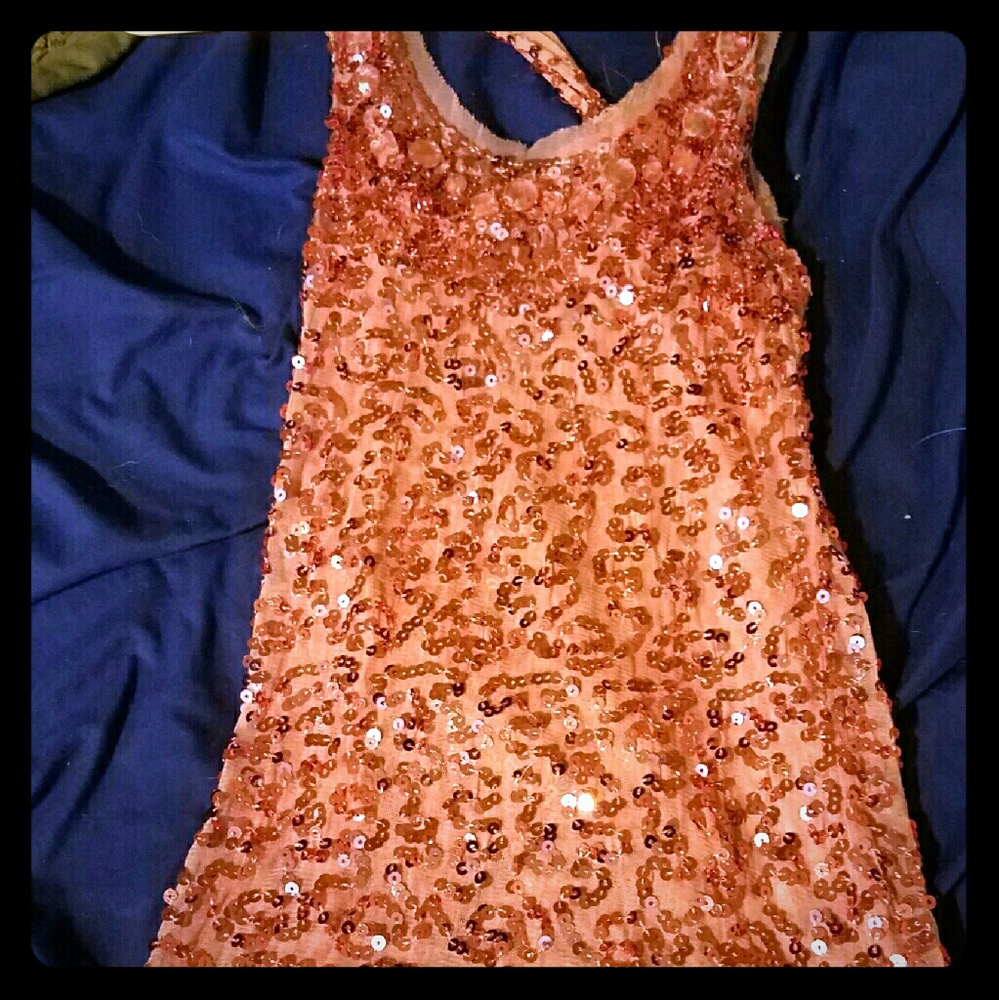 Sheer pink sequined tank top