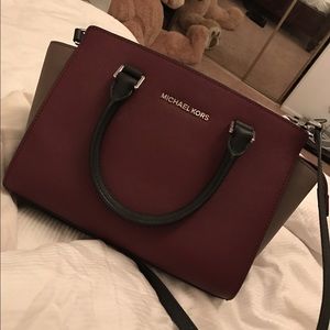 Michael Kors burgundy bag/medium size/ barely used