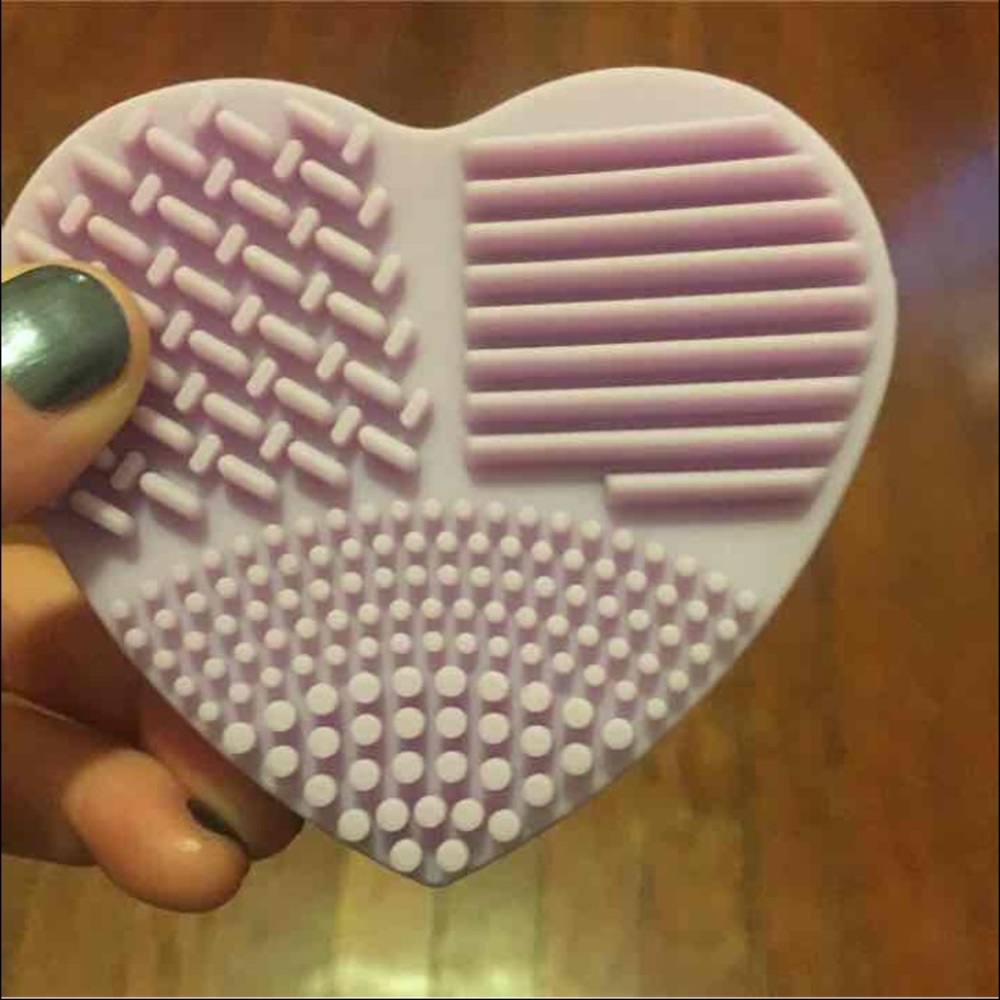 Small, rubber makeup brush cleaner