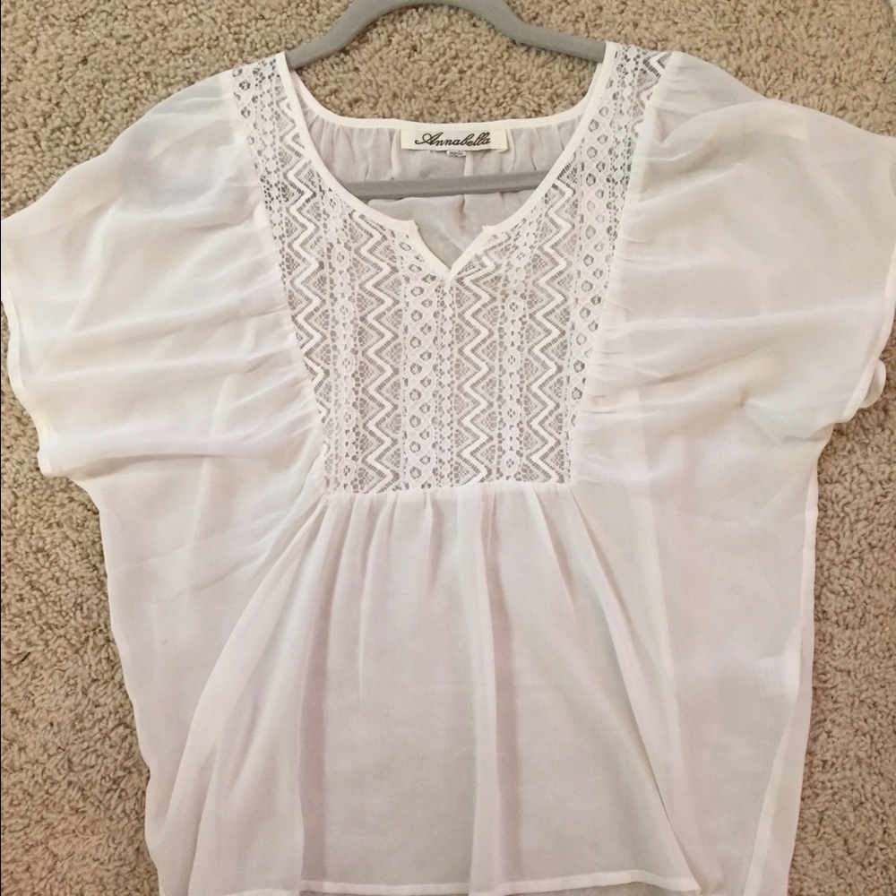 white flowy short-sleeved top