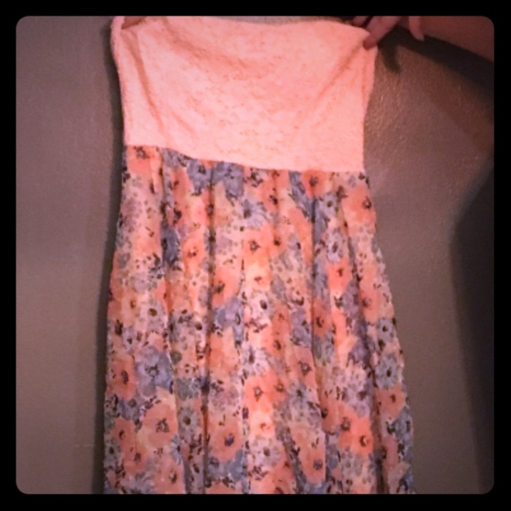 Peach sun dress that flows off your curves