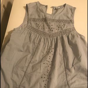 Light grey tank top with cut out deatails