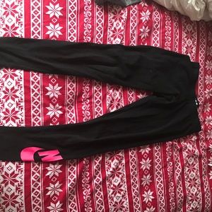 Black and pink Nike leggings