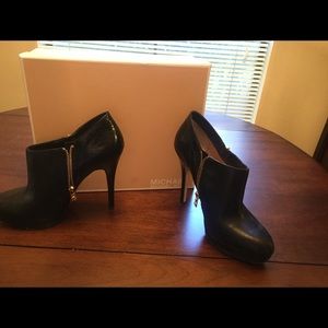 Authentic slightly worn Michael kors booties