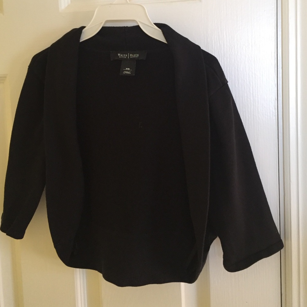 White House Black Market shrug