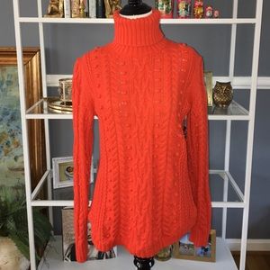 Cozy turtle neck knit sweater. Machine wash.