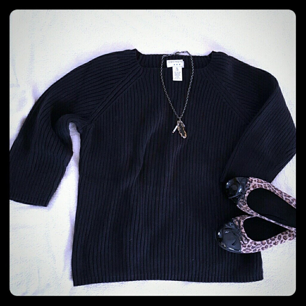 Black three-quarter-length sleeve sweater