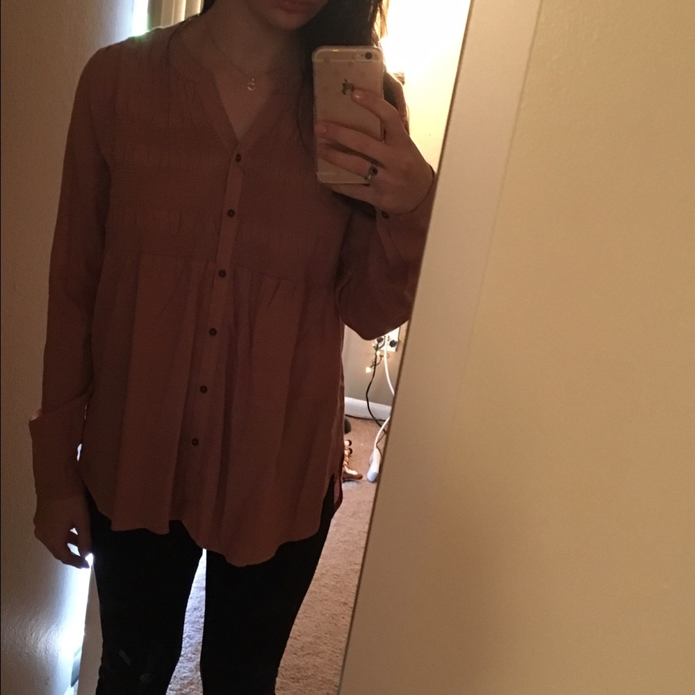 Pinkish mauve colored button up