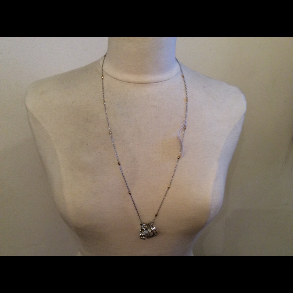 Coach silver and gold long ring necklace