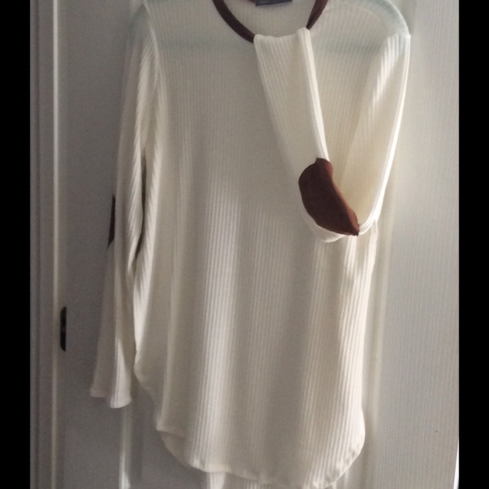 Sale! NWOT Never worn. Soft, cuddly light sweater.