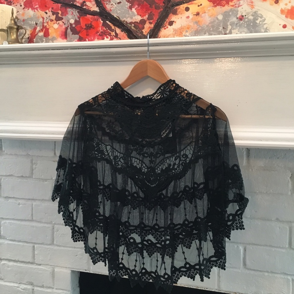 Lace poncho with beautiful scallop detail