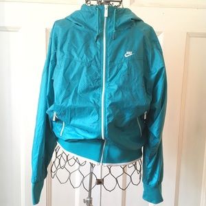 turquoise windbreaker nike