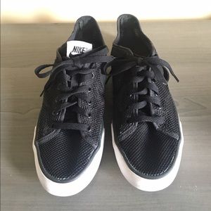 Black mesh Nike sneakers