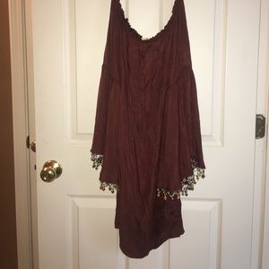 Brown shift dress with bell sleeves.