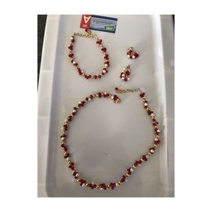 Necklace earrings and  bracelet