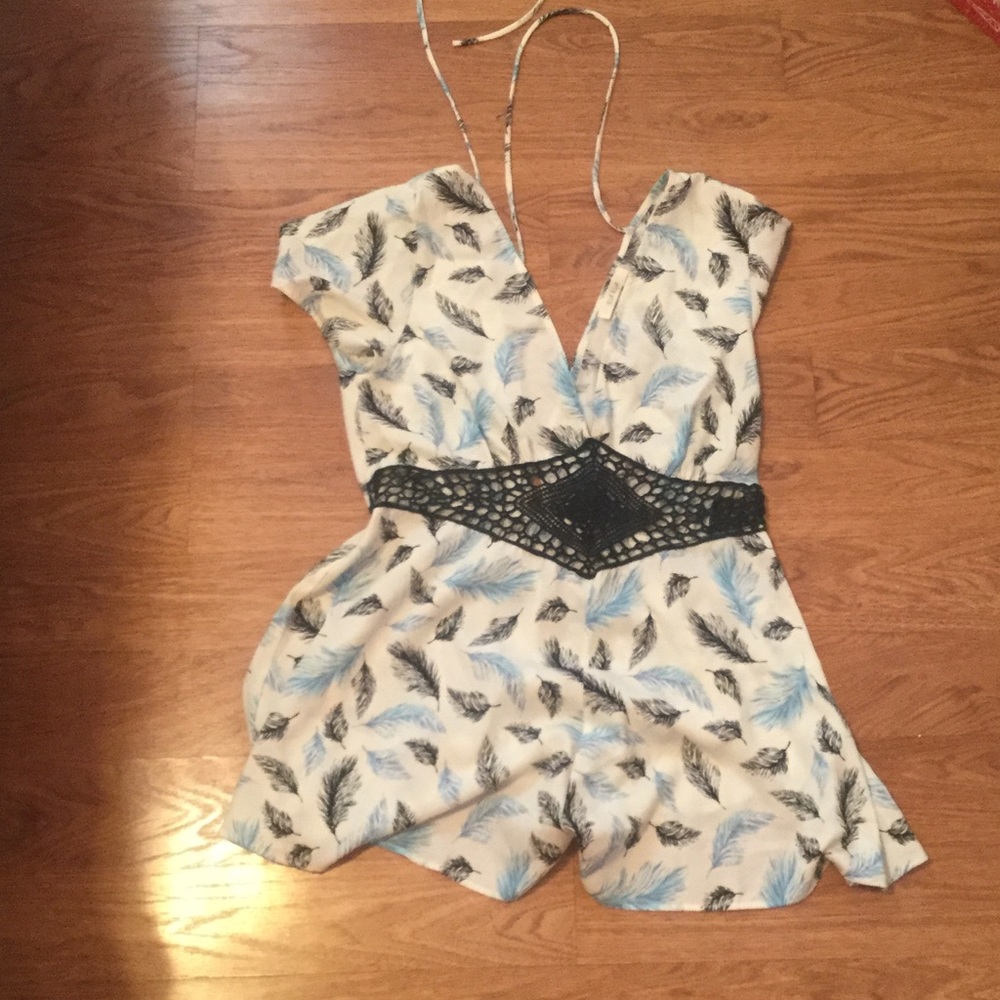 Blue romper with feather details