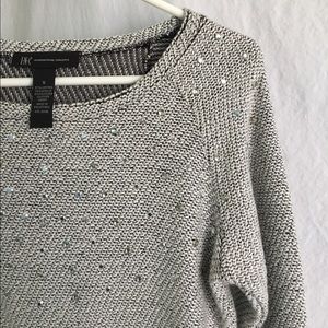 Simple Grey Sweater with a Twist of Glamor