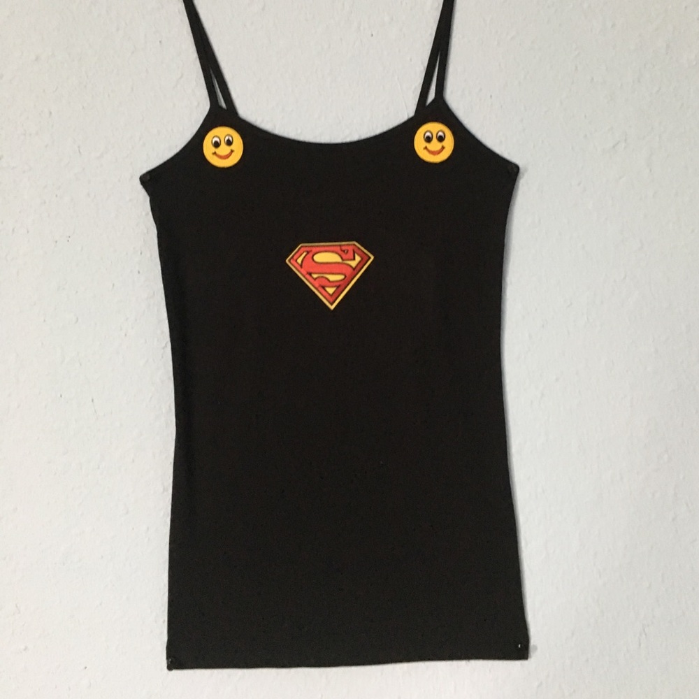 A brand new black tank top w/embroidered patches!