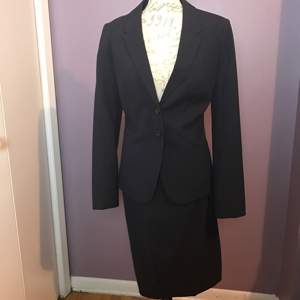 Navy blue women's skirt suit