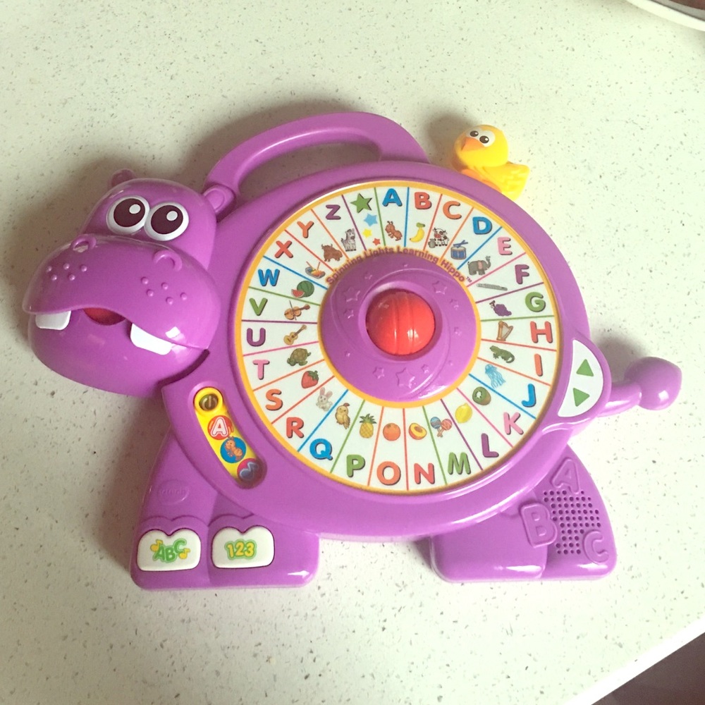 Spinning lights learning hippo baby toy