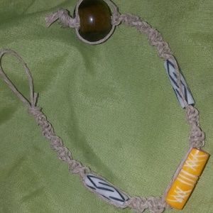 Hand made hemp bracelet with yellow and white bead