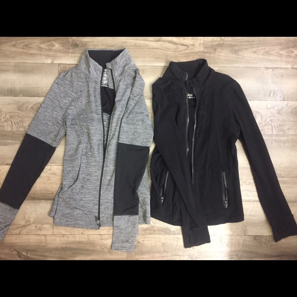 Black and gray zip up hoodies