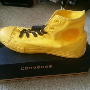 Yellow converse shoes