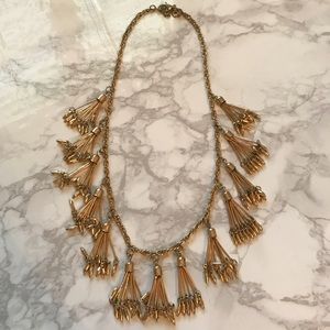 Puck tassel strand statement necklace