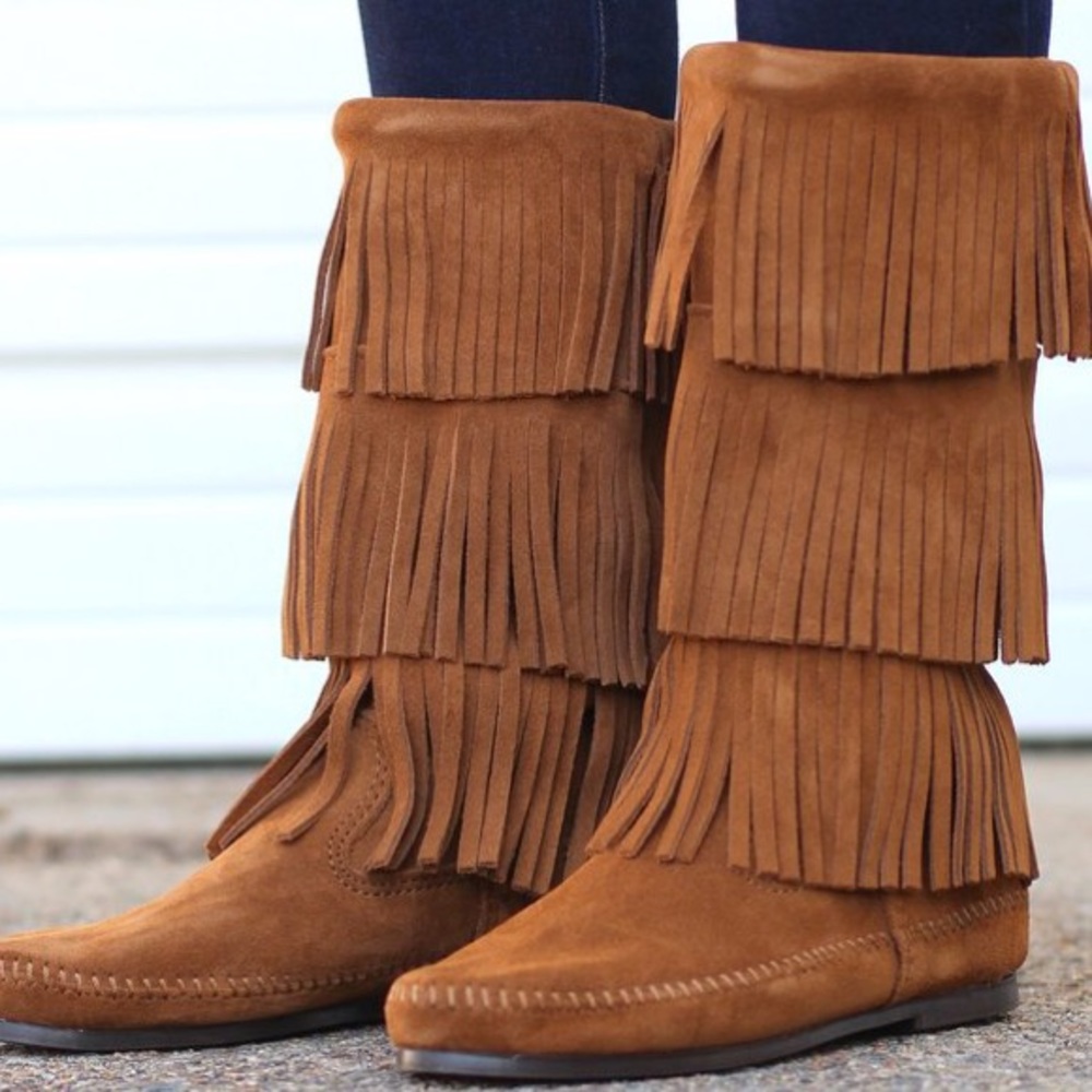 Brown three later Minnetonka fringe boots