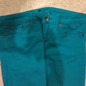 Turquoise ankle pants.