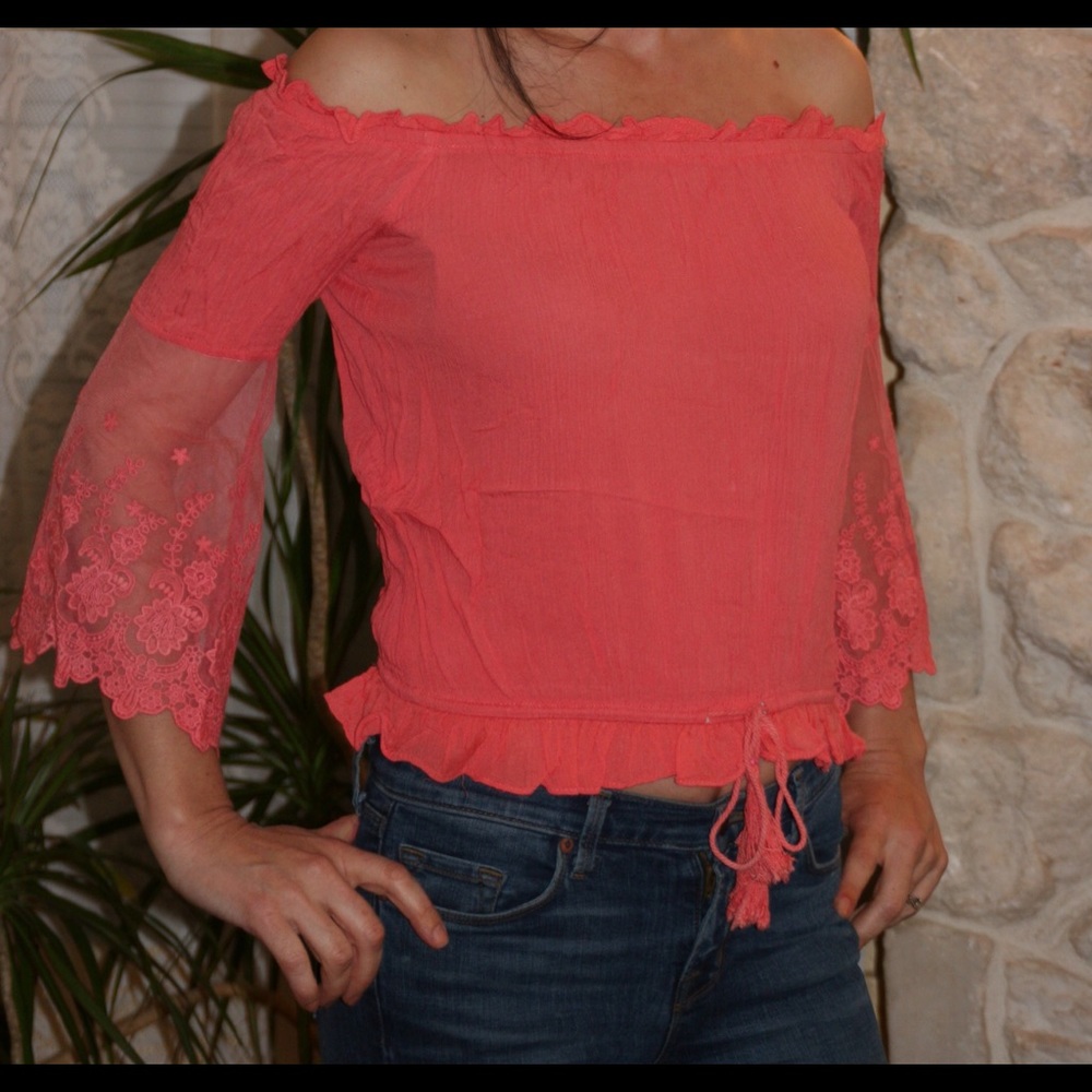 Coral crop top with lace sleeves