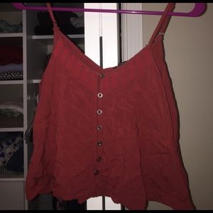 Loose fitting shirt. Cute features to the shirt.