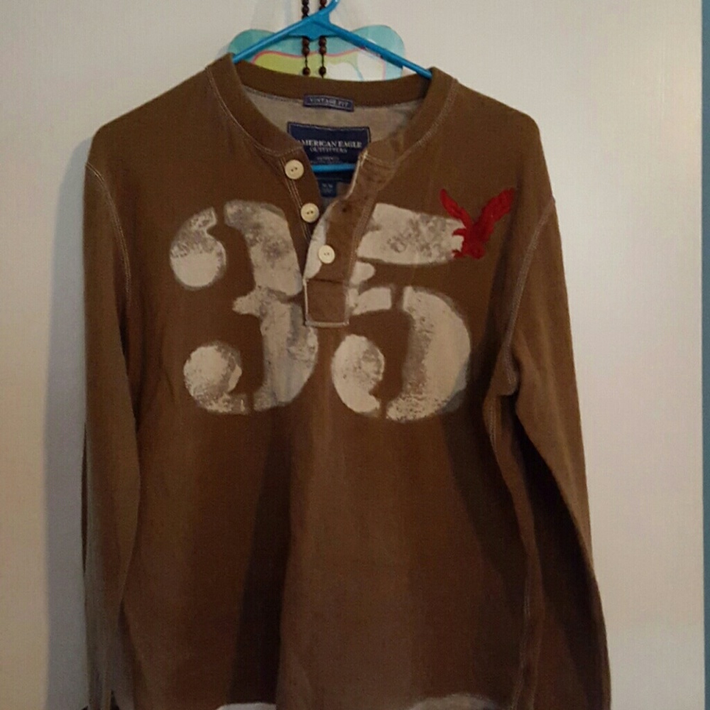 American Eagle shirt,brown 35,logo red