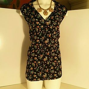 Floral blouse.     (BT1)