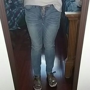 Light wash, mid waisted, distressed skinny jeans