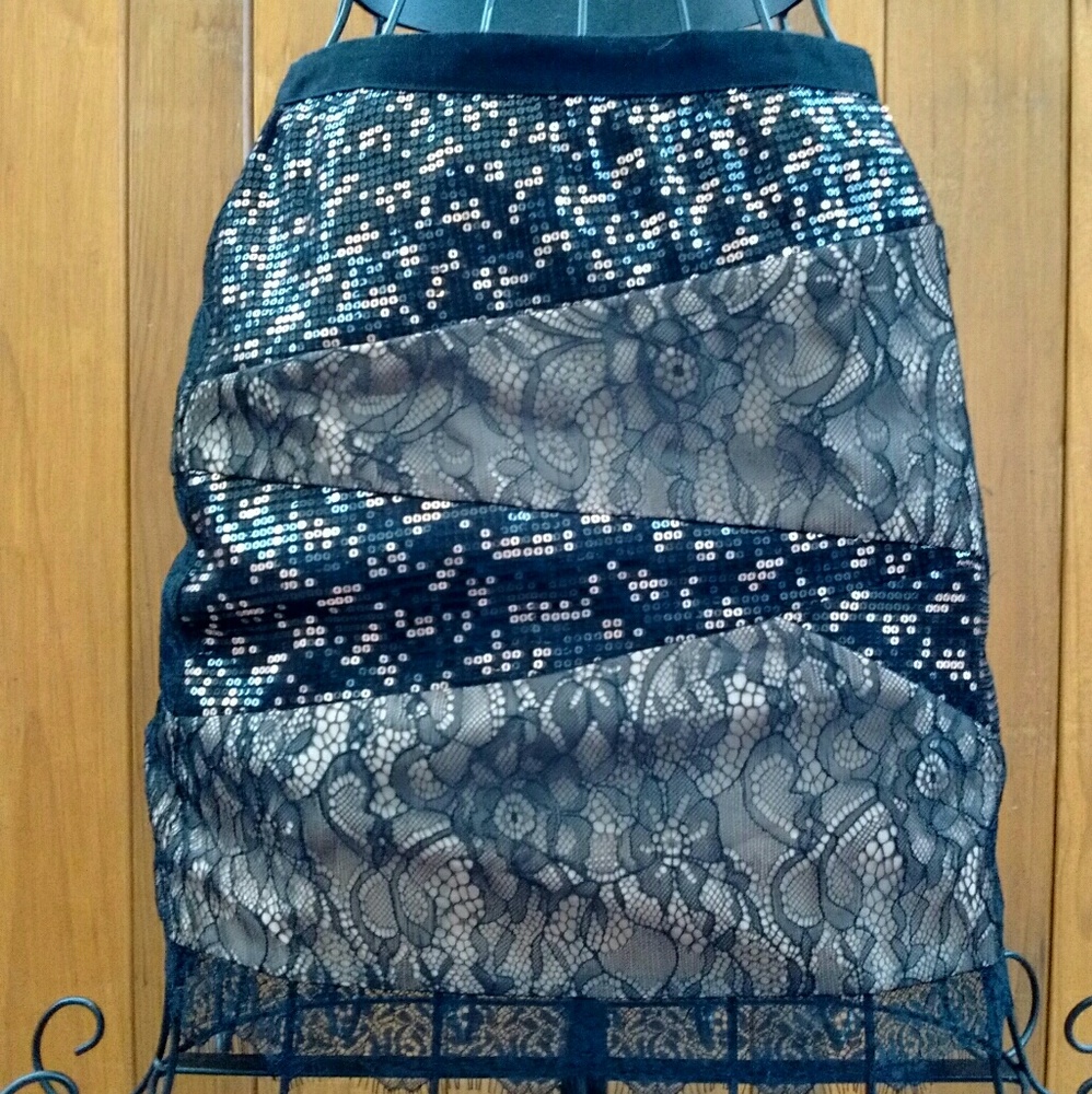 Short tight skirt with black lace and cutouts